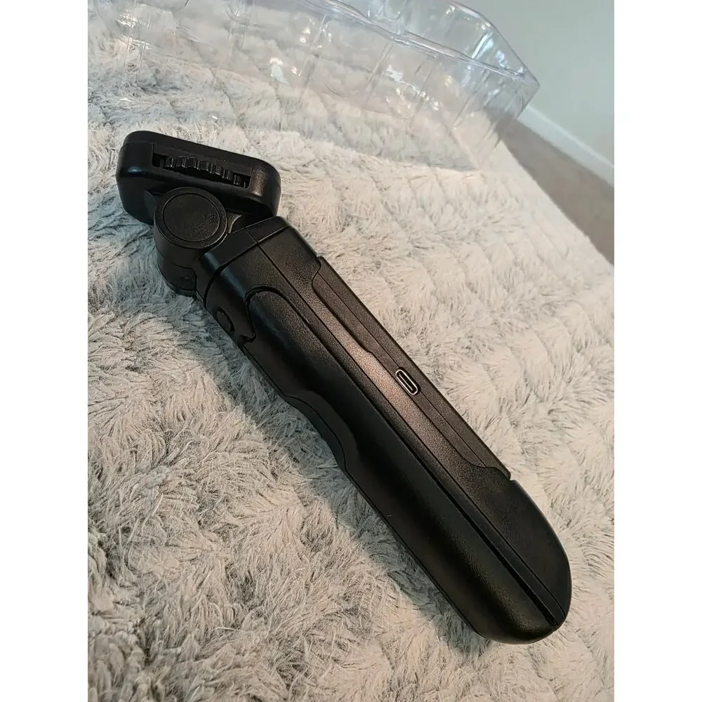 Hanpusen Wireless Remote Control Tripod Grip for Digital Cameras